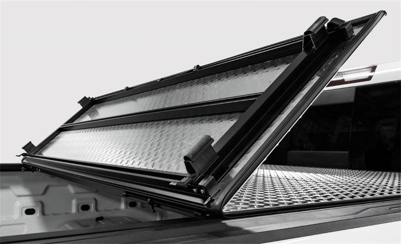 LOMAX FOLDING HARD COVER Tonneau Cover for 20-ON Chevy/GMC 2500/3500 6' 8" Box w/o Bedside Storage Box (Black) - Accessories from Black Patch Performance