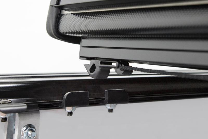 LOMAX FOLDING HARD COVER Tonneau Cover for 20-ON Chevy/GMC 2500/3500 6' 8" Box w/o Bedside Storage Box (Black) - Accessories from Black Patch Performance