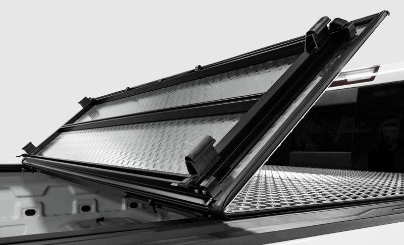 LOMAX FOLDING HARD COVER Tonneau Cover for 20-ON Chevy/GMC 2500/3500 6' 8" Box w/o Bedside Storage Box (Black) - Accessories from Black Patch Performance