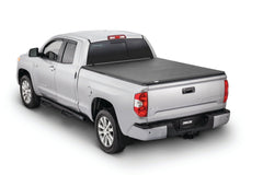 0515 TACOMA SB 6FT TRIFOLD COVER - Black Patch Performance - TONN42500