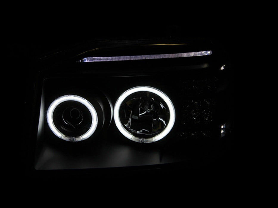 01-04 Nissan Frontier Headlight Set - Black Patch Performance - 111172