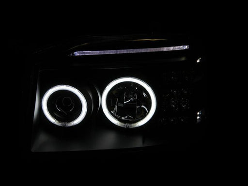 01-04 Nissan Frontier Headlight Set - Black Patch Performance - ANZO111172