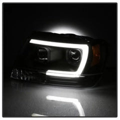 99-04 Jeep Grand Cherokee Headlight Set - Black Patch Performance - SPYD5085221